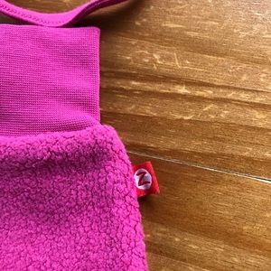 zutano mittens on a string